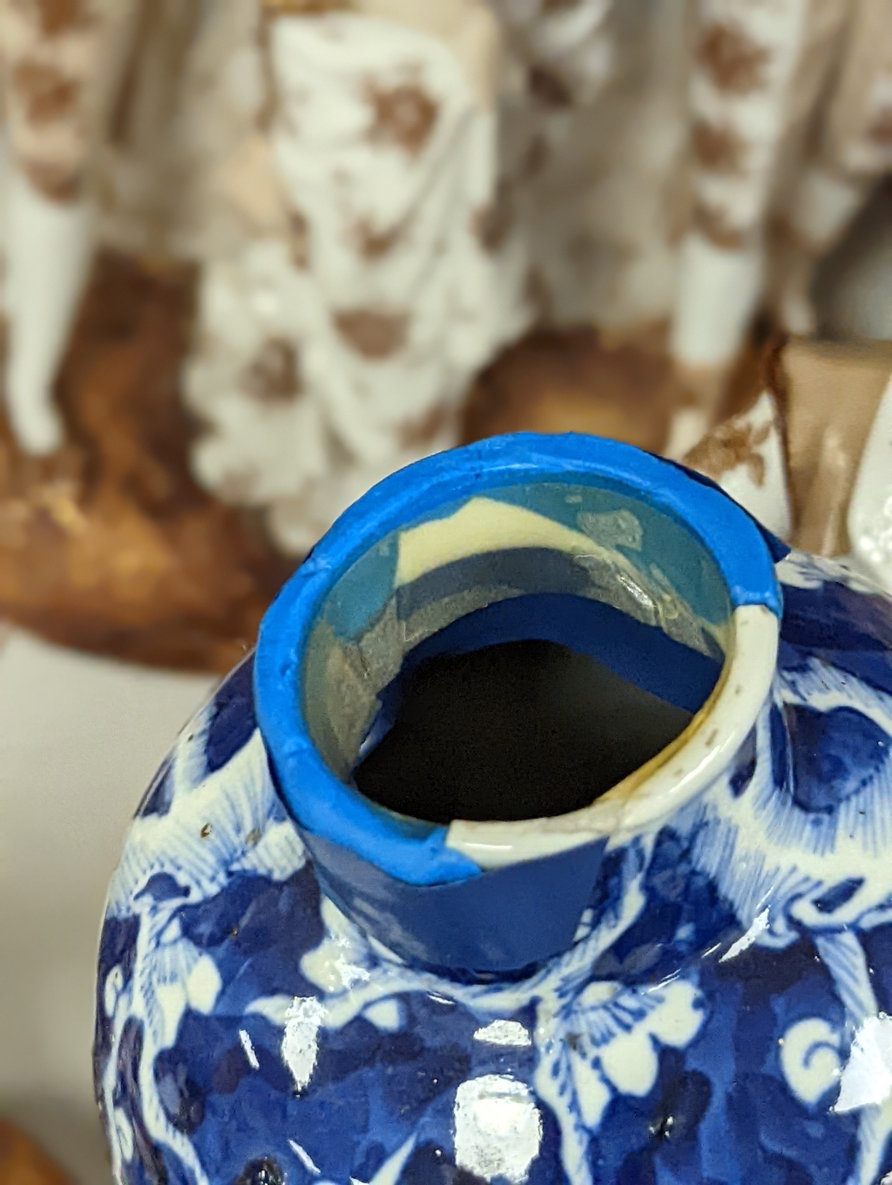 A pair of Chinese blue and white vases and eleven jars, six with covers., Vase and matching cover 28 cms high.